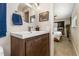 Modern bathroom vanity with sleek wood cabinets at 6780 S Grant St, Centennial, CO 80122