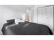 Bedroom with queen bed and ample closet space at 18936 E Colorado Dr, Aurora, CO 80017