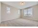 Spacious bedroom with neutral carpeting and large windows at 8363 Mount Kataka St, Littleton, CO 80125