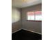 Simple bedroom with dark hardwood floors at 1860 S Dahlia St, Denver, CO 80222