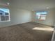 Bright bedroom with carpeted floor and large windows at 4859 Astor Pl, Brighton, CO 80601