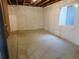 Unfinished basement with concrete floors and a window at 9023 Harlequin Cir, Longmont, CO 80504