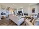 Spacious living room featuring a marble fireplace and hardwood floors at 4673 W 50Th Pl, Denver, CO 80212