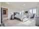 Second bedroom with ensuite bathroom, featuring a comfortable sitting area at 4673 W 50Th Pl, Denver, CO 80212