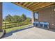 Covered patio with a view of a golf course at 4673 W 50Th Pl, Denver, CO 80212