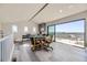 Game room with poker table, access to deck with city views at 4673 W 50Th Pl, Denver, CO 80212