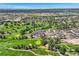 Community overview featuring homes near golf course and city views at 4673 W 50Th Pl, Denver, CO 80212