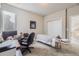 Spacious home office with a desk, massage table and closet at 4673 W 50Th Pl, Denver, CO 80212
