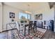 Bright dining room with hardwood floors and large windows at 4673 W 50Th Pl, Denver, CO 80212