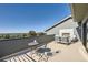 Private rooftop deck with seating area and city views at 4673 W 50Th Pl, Denver, CO 80212