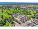 Community nestled on golf course with mountain views at 4673 W 50Th Pl, Denver, CO 80212