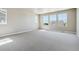 Bright and airy bedroom with large windows at 9998 Racine St, Commerce City, CO 80022