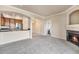 Open kitchen with stainless steel appliances and breakfast bar at 1801 S Dunkirk St # 303, Aurora, CO 80017