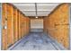 Unfinished garage with concrete floor at 1801 S Dunkirk St # 303, Aurora, CO 80017