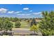 Community view showing green spaces and residential homes at 1801 S Dunkirk St # 303, Aurora, CO 80017
