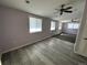 Large bonus room with ceiling fan and grey tile floors at 3060 S Hannibal St, Aurora, CO 80013