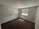 Well-lit bedroom with neutral walls and carpet flooring at 3060 S Hannibal St, Aurora, CO 80013