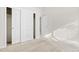Well-lit bedroom with large closet and neutral walls at 2951 S Walden Ct, Aurora, CO 80013