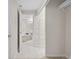 Basement bathroom with soaking tub, walk-in shower, and closet at 2951 S Walden Ct, Aurora, CO 80013