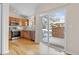 Kitchen boasts stainless steel appliances and access to backyard at 2951 S Walden Ct, Aurora, CO 80013