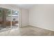 Carpeted bedroom with sliding door to private patio at 2951 S Walden Ct, Aurora, CO 80013