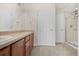 Double vanity bathroom with shower and separate toilet at 2951 S Walden Ct, Aurora, CO 80013