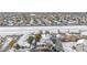 Aerial view of townhouses with snow-covered landscape at 2951 S Walden Ct, Aurora, CO 80013