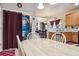 Casual dining area near laundry, kitchen, and Gathering room at 14389 E 101St Pl, Commerce City, CO 80022