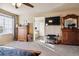 Main bedroom with large windows and a view of the en-suite bathroom at 14389 E 101St Pl, Commerce City, CO 80022
