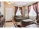 Living room with couch and access to entryway at 14389 E 101St Pl, Commerce City, CO 80022