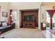Spacious living room with leather couches and a large TV at 14389 E 101St Pl, Commerce City, CO 80022