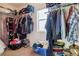 Large walk-in closet with ample shelving and hanging space at 14389 E 101St Pl, Commerce City, CO 80022