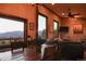 Spacious dining area with a view of mountains and a ceiling fan at 1528 Chinook Rd, Idaho Springs, CO 80452