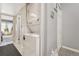Stackable washer and dryer in hallway at 1148 S Ventura Cir # E, Aurora, CO 80017