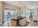 Modern dining room with sliding doors leading to a patio at 305 W Charles St, Superior, CO 80027