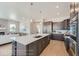 Large kitchen island with quartz countertops at 305 W Charles St, Superior, CO 80027