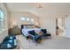 Main bedroom with king bed, ensuite bathroom access, and sitting area at 305 W Charles St, Superior, CO 80027