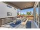 Covered patio perfect for outdoor dining with wooden benches and table at 305 W Charles St, Superior, CO 80027