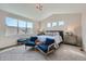Spacious main bedroom with vaulted ceiling, large windows, and sitting area at 305 W Charles St, Superior, CO 80027