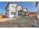 Two-story home with backyard patio and wooden fence at 305 W Charles St, Superior, CO 80027