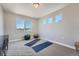 Home office or gym with large windows and yoga mats at 305 W Charles St, Superior, CO 80027