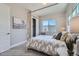 Bright bedroom with queen bed and closet at 305 W Charles St, Superior, CO 80027
