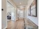 Bright and spacious entryway with hardwood floors and a view into the living room at 305 W Charles St, Superior, CO 80027