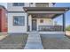 Covered front porch with railing, steps, and space for seating at 305 W Charles St, Superior, CO 80027