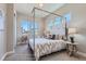 Bedroom with canopy bed and ample natural light at 305 W Charles St, Superior, CO 80027