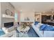 Living room with a fireplace and a large, rustic wood coffee table at 305 W Charles St, Superior, CO 80027