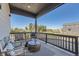 Relaxing patio area with wicker furniture and a coffee table at 305 W Charles St, Superior, CO 80027
