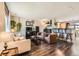 Bright living room with hardwood floors and comfortable seating at 6123 Ralston St, Frederick, CO 80530