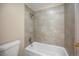 Updated bathroom with a tub and shower at 1496 S Pierson St # 116, Denver, CO 80232