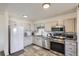 Well-equipped kitchen featuring granite countertops and stainless steel appliances at 300 S Clinton St # 8C, Denver, CO 80247